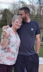 Yvonne McIsaac embracing her son, Russell.